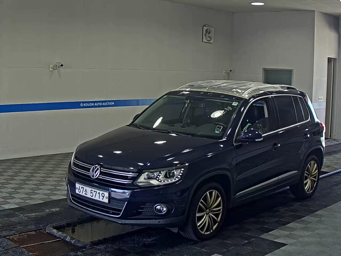 VOLKSWAGEN TIGUAN 2.0 TDI BLUEMOTION PREMIUM 2012 - zdjęcie 2