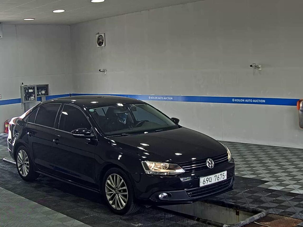 VOLKSWAGEN JETTA (6TH GEN) 1.6 TDI BLUEMOTION 2013 - zdjęcie 3