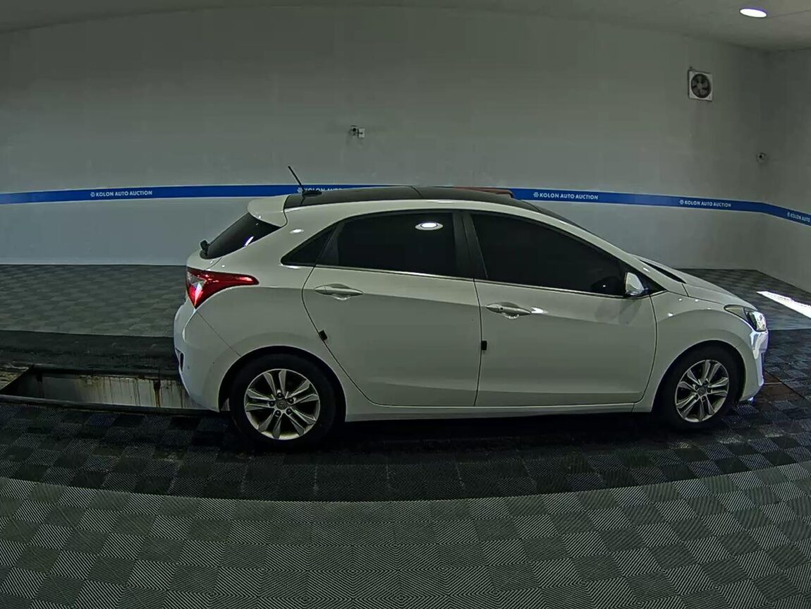 HYUNDAI NEW i30 1.6 GDi UNIQUE 2012 - zdjęcie 4